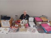 Hospitality Room Table With Sheila Taking Charge